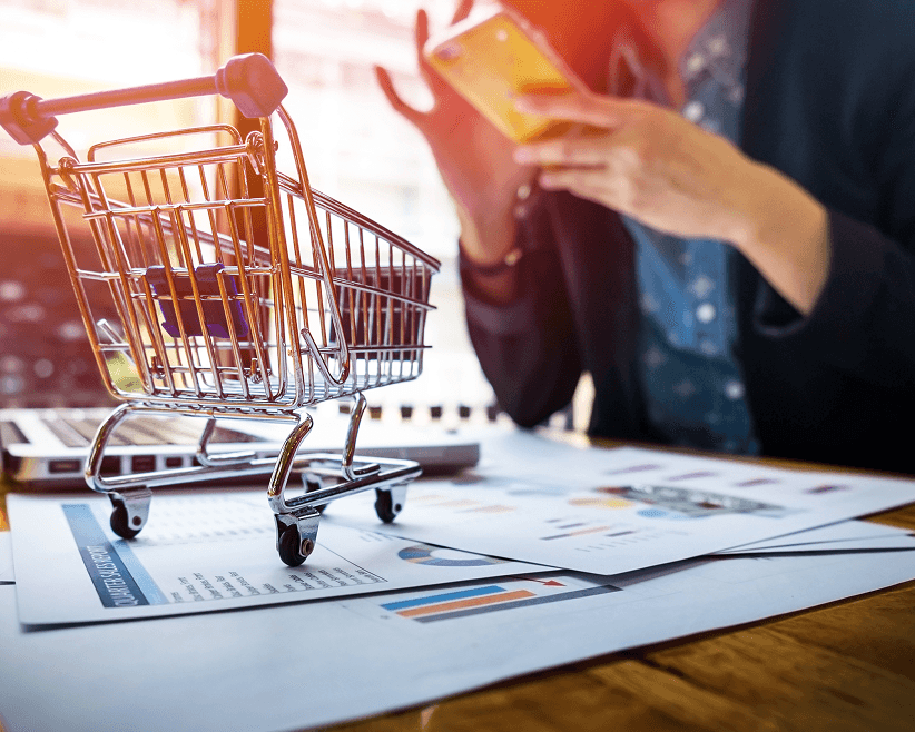 Shopping cart on business charts