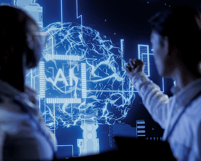 Two people looking at an AI data screen