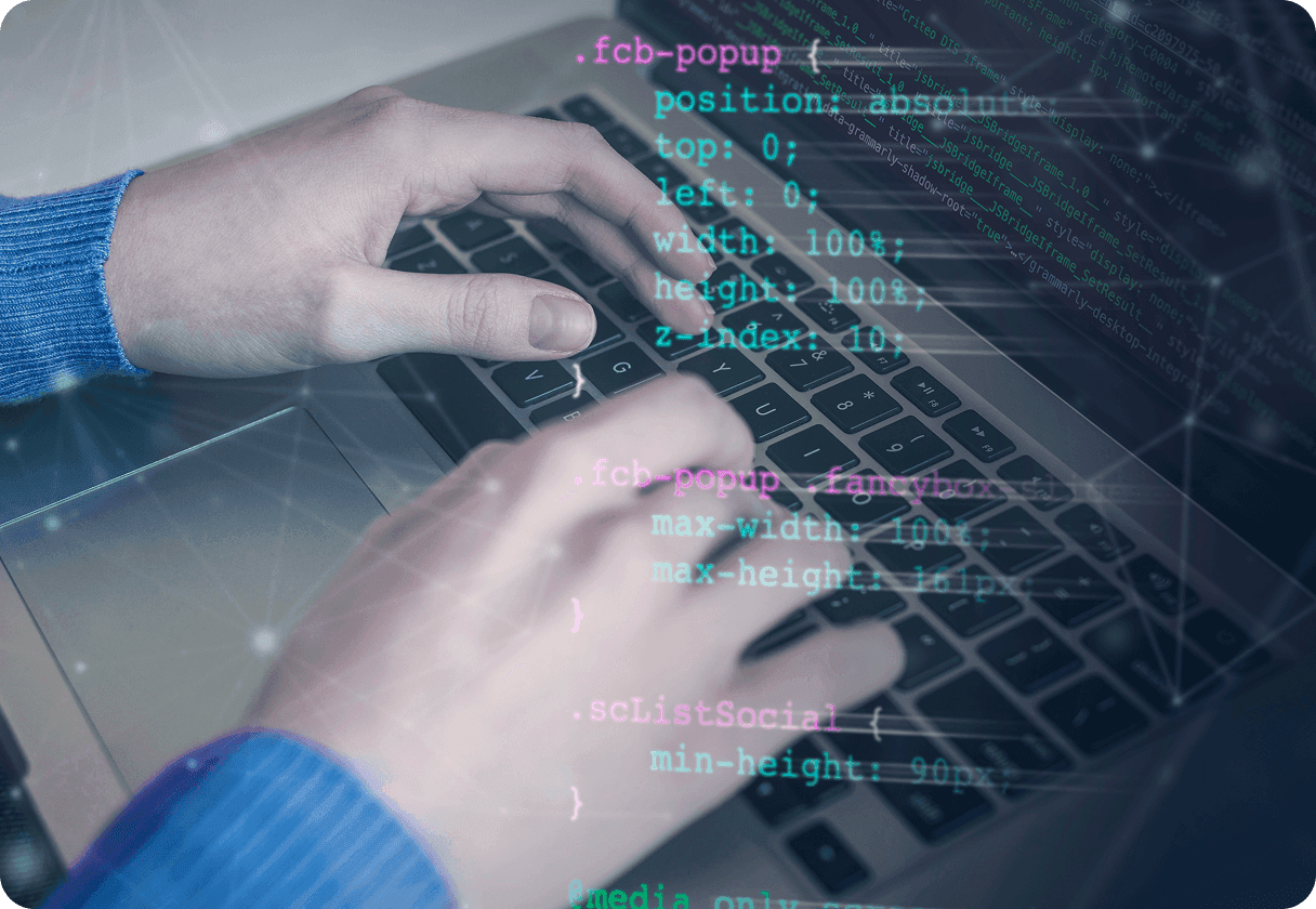 Coding on laptop with overlaid CSS