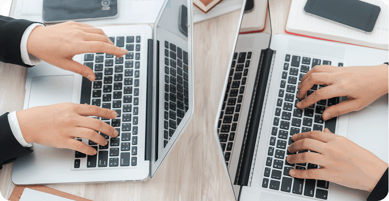 Hand holding a Node.js sticker