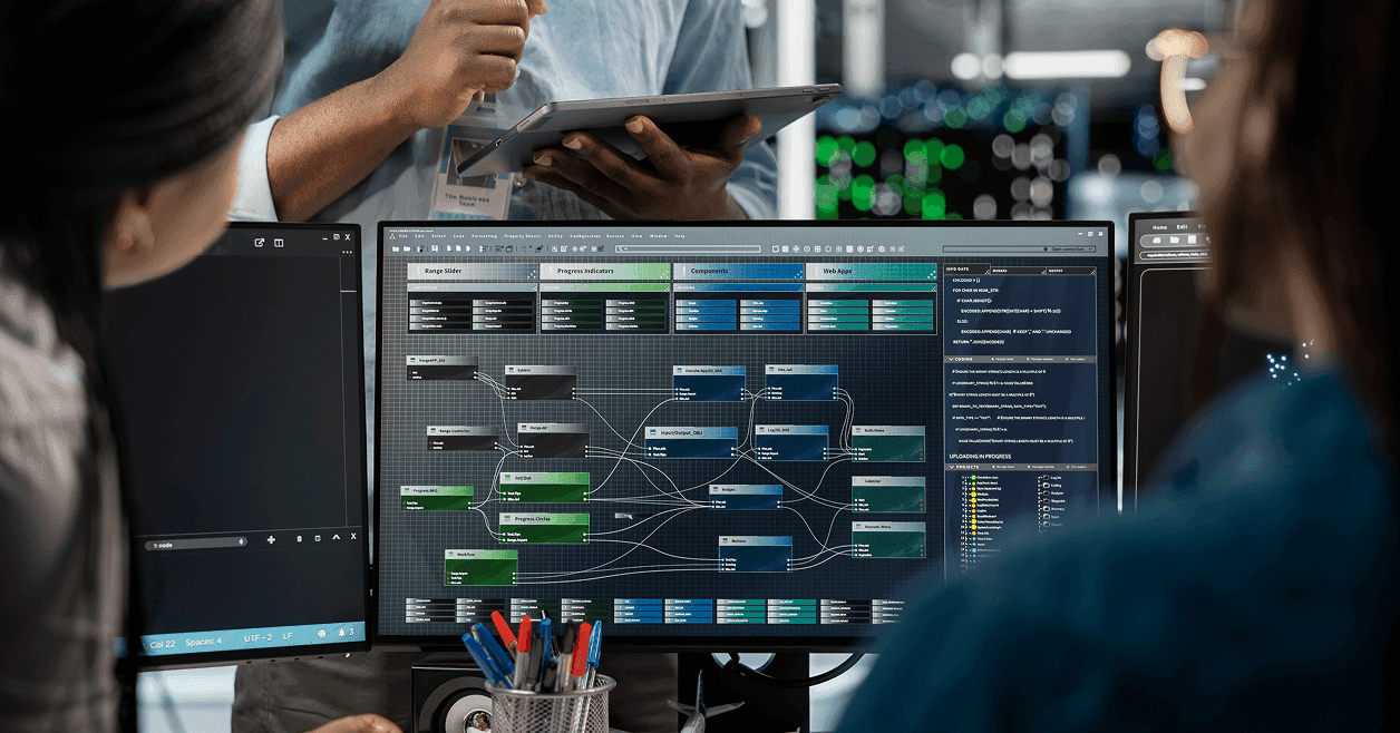 Team reviewing system architecture on a computer screen